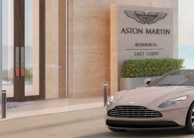 3D rendering sample of an Aston Martin car arriving at Aston Martin Residences' entrance.