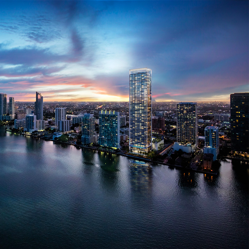 3D rendering sample of the exterior design for Missoni Baia condo at dusk with neighboring buildings.
